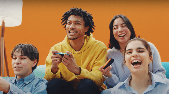 Players laugh together as they play Nintendo Switch 2.