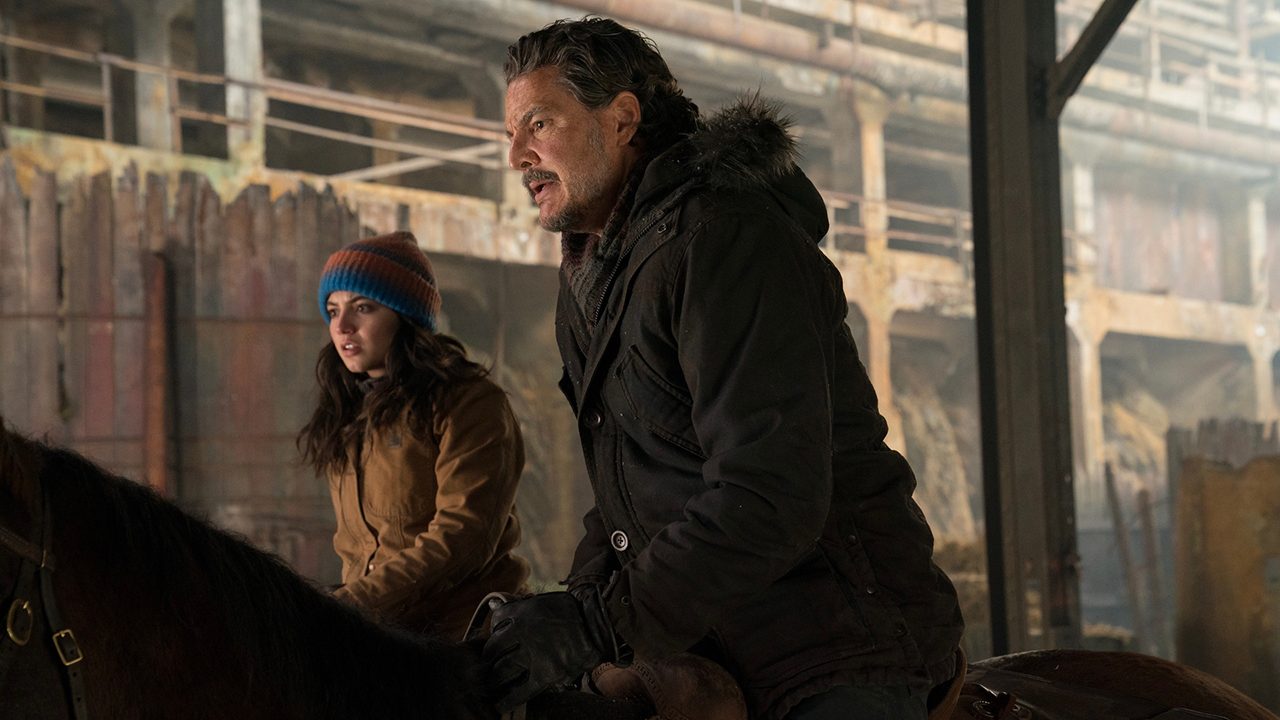 Joel riding a horse with a young woman on another beside him in The Last of Us season 2.