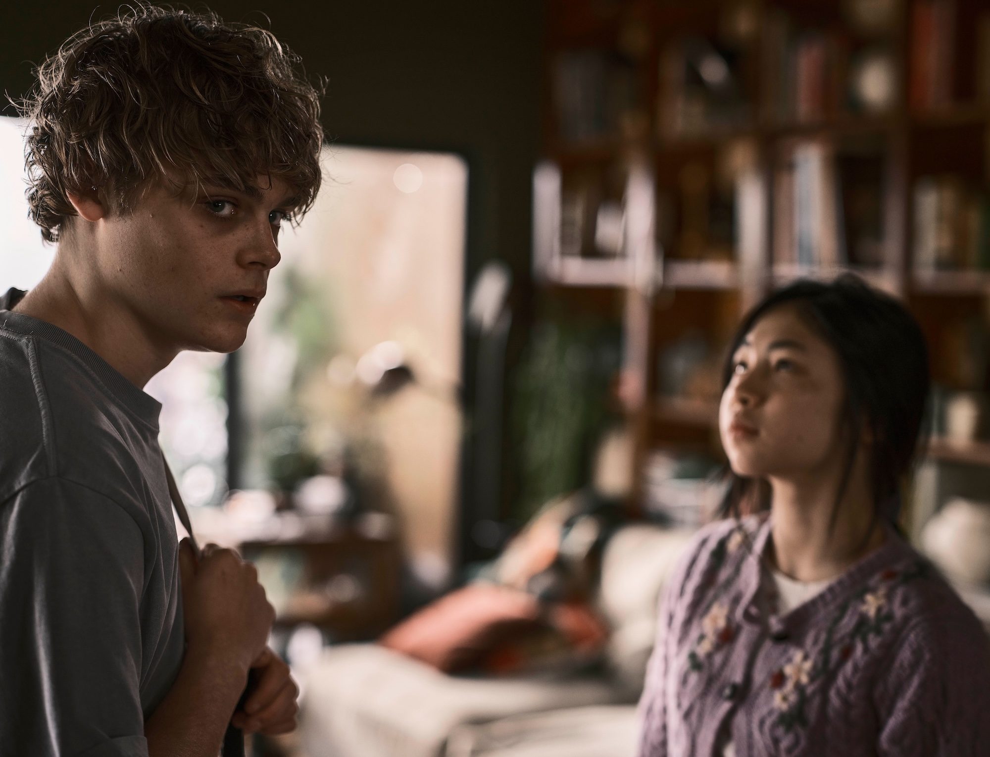 A boy and girl stare at each other in Bring Her Back.