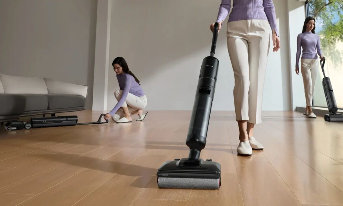 The Dreame H12 Pro FlexReach pushed around a house.