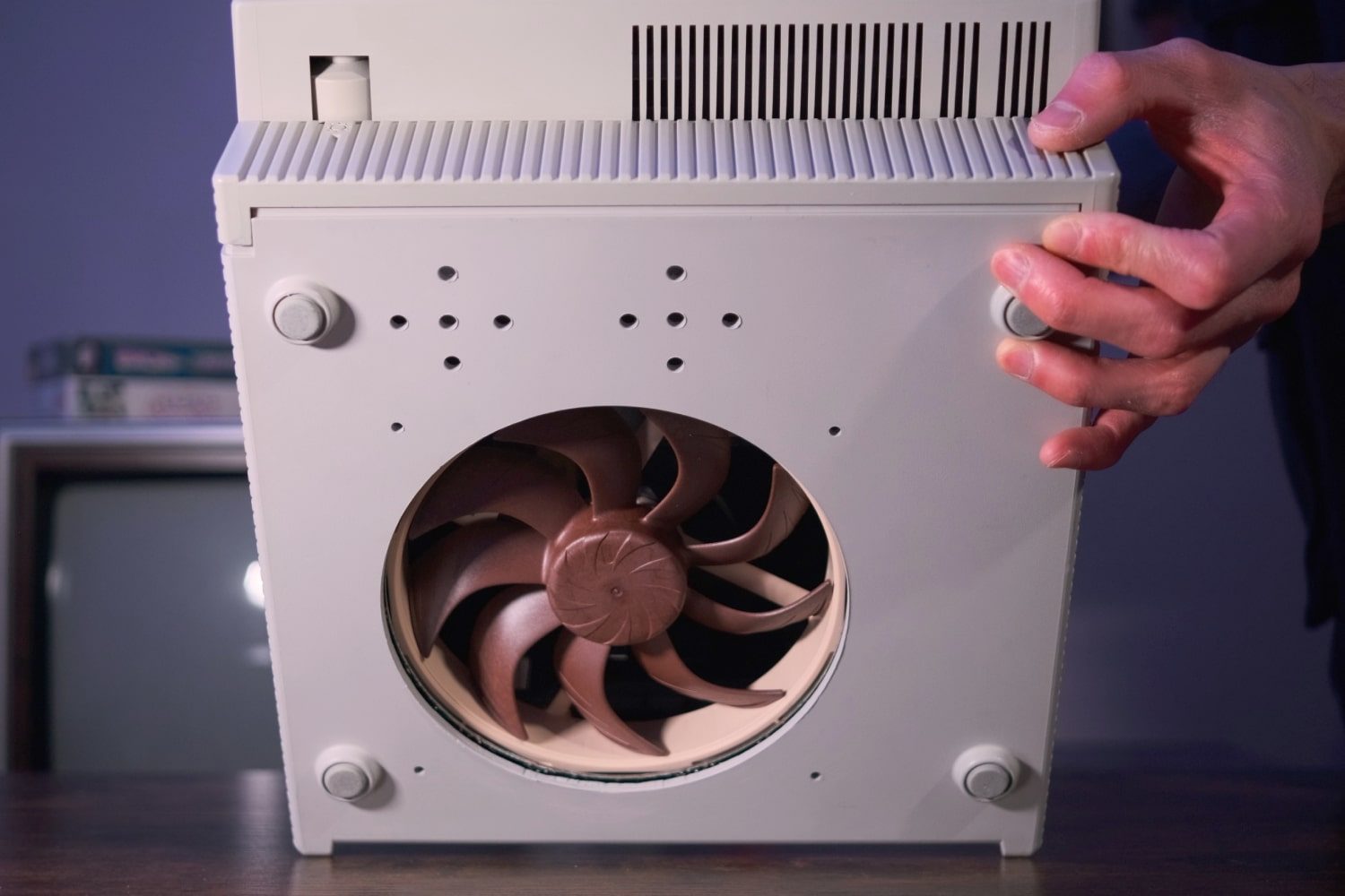The "Joshintosh," a custom PC built inside a 1980s Macintosh SE case, on a desk.