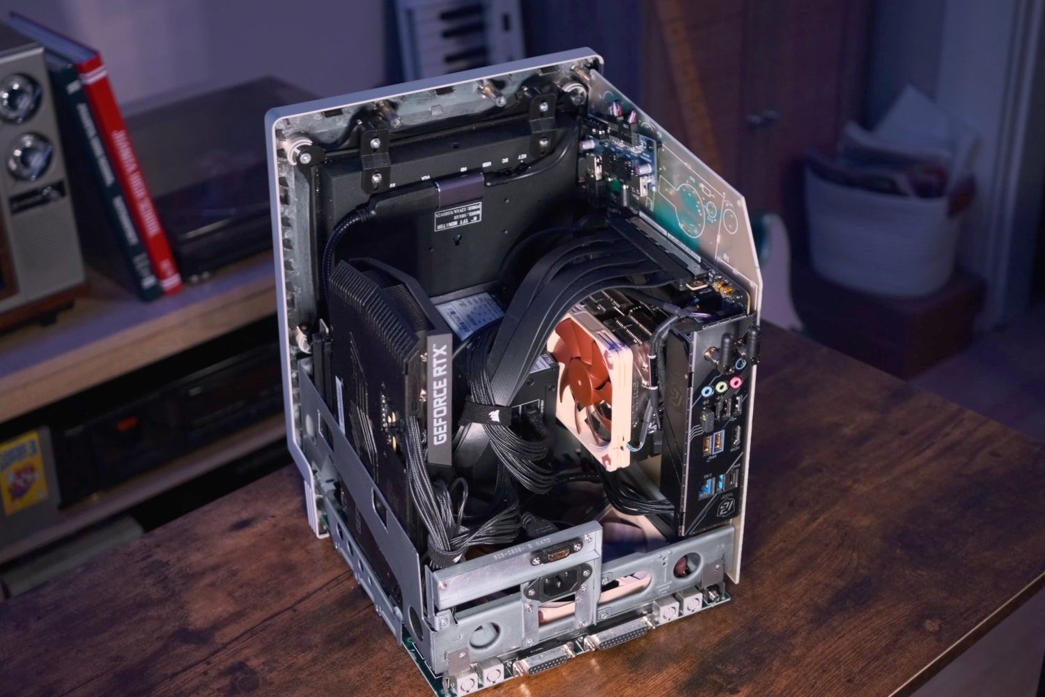 The "Joshintosh," a custom PC built inside a 1980s Macintosh SE case, on a desk.