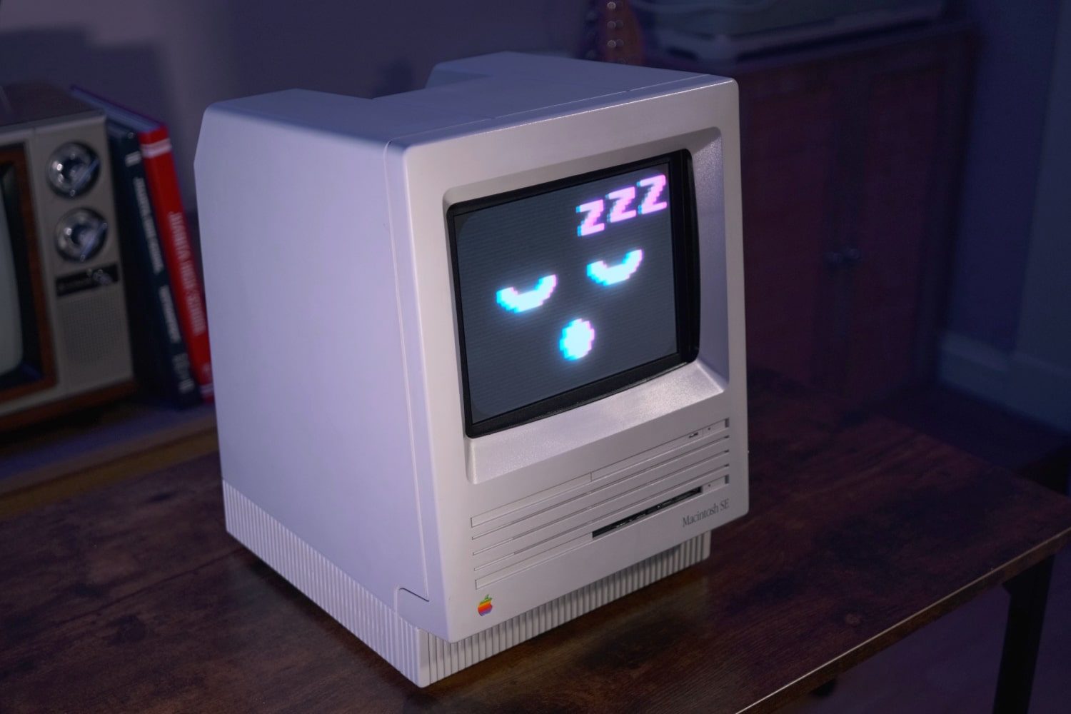 The "Joshintosh," a custom PC built inside a 1980s Macintosh SE case, on a desk.