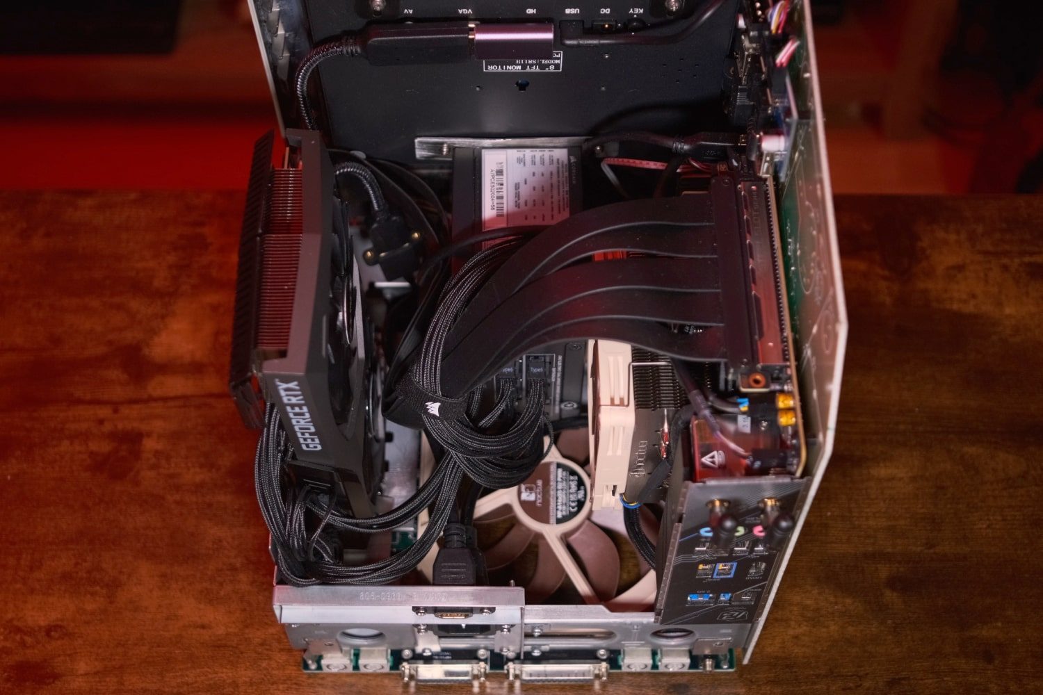 The "Joshintosh," a custom PC built inside a 1980s Macintosh SE case, on a desk.