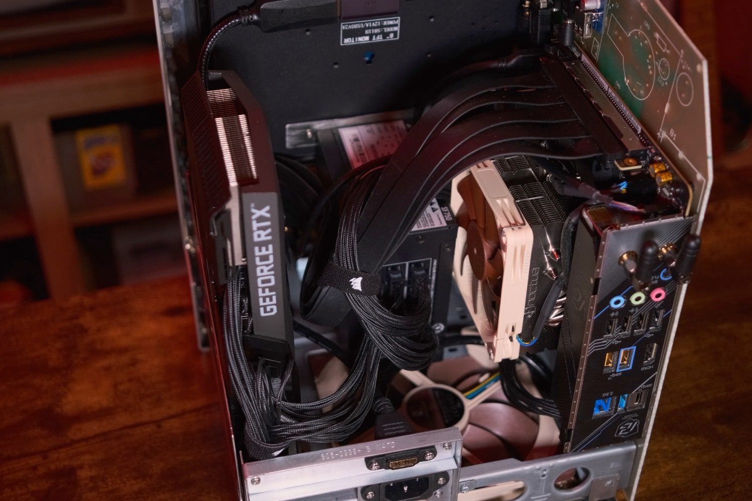 The "Joshintosh," a custom PC built inside a 1980s Macintosh SE case, on a desk.