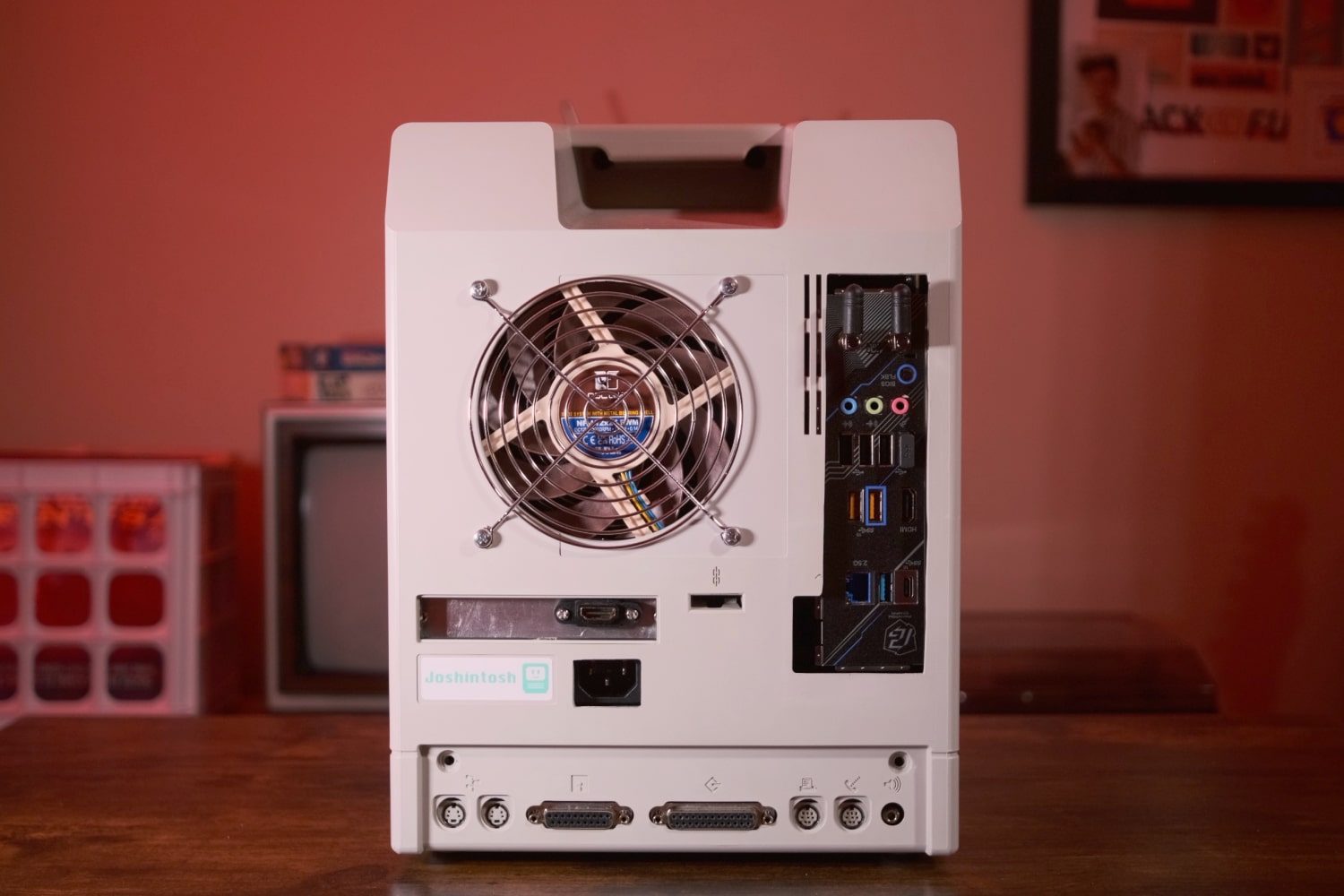 The "Joshintosh," a custom PC built inside a 1980s Macintosh SE case, on a desk.