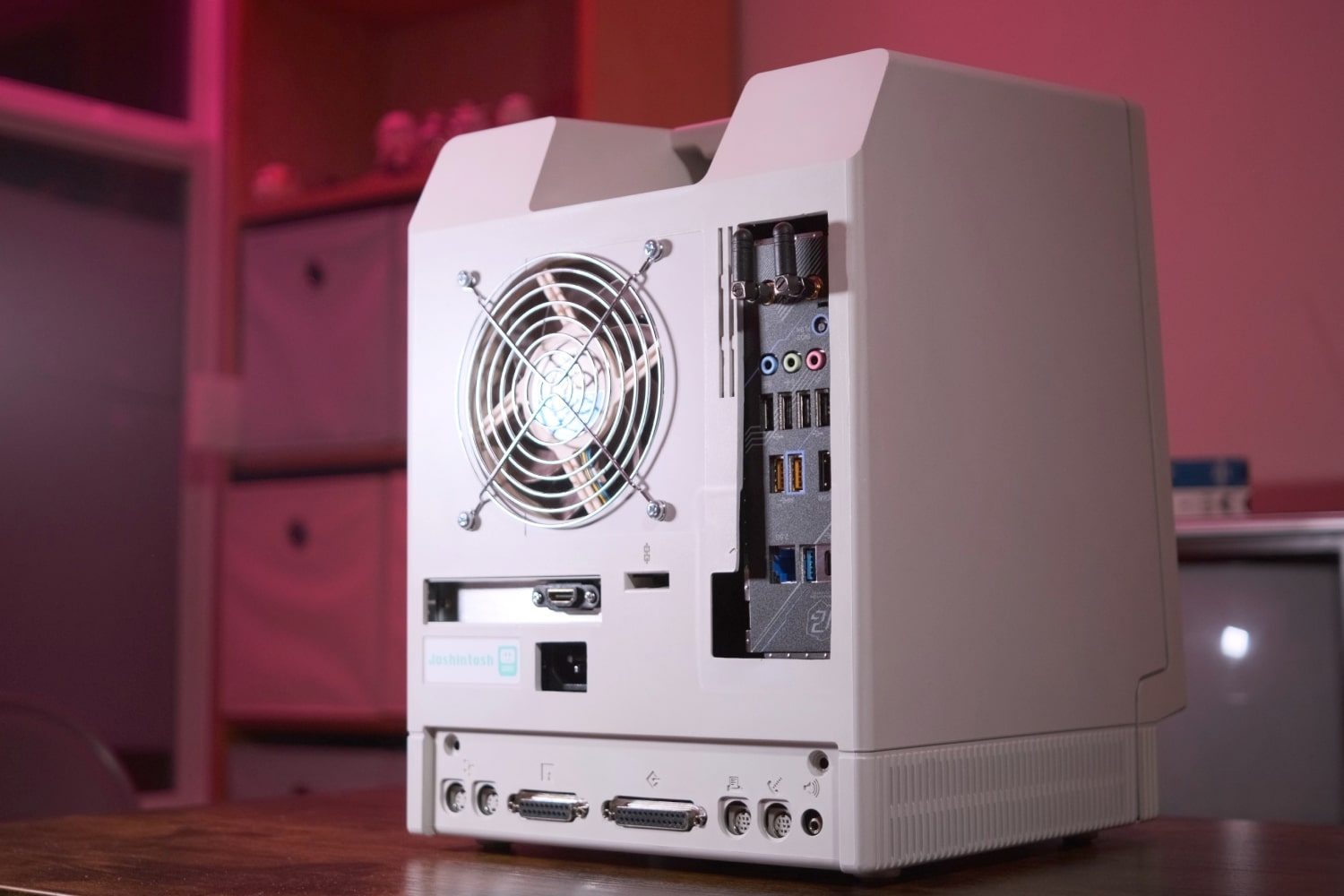 The "Joshintosh," a custom PC built inside a 1980s Macintosh SE case, on a desk.