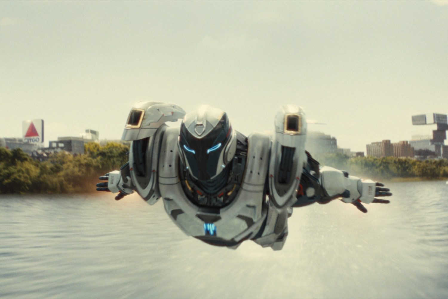 Ironheart flies over the water.