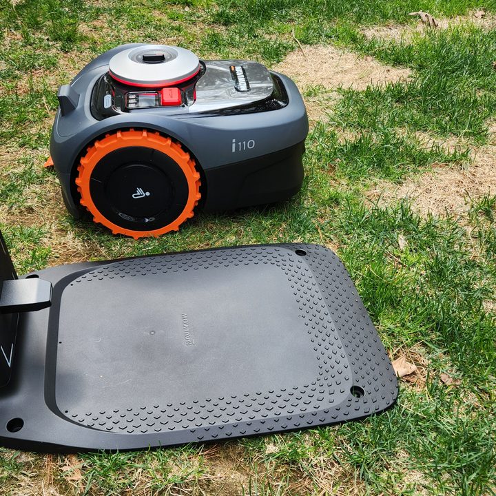 Segway Navimow i110 robot lawn mower and docking station.