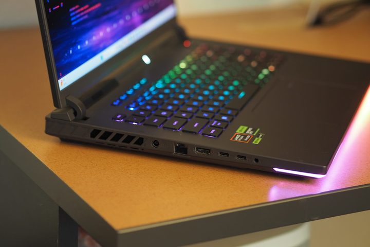 Asus ROG Strix G16 side view showing vents and lighting.