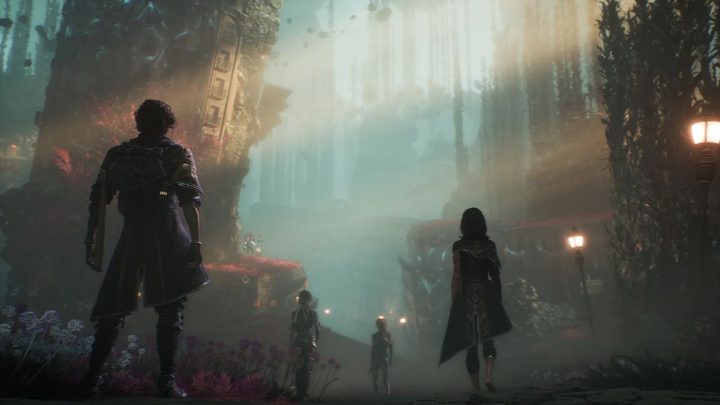 A group of explores walk through an under water valley with ruined buildings on the side