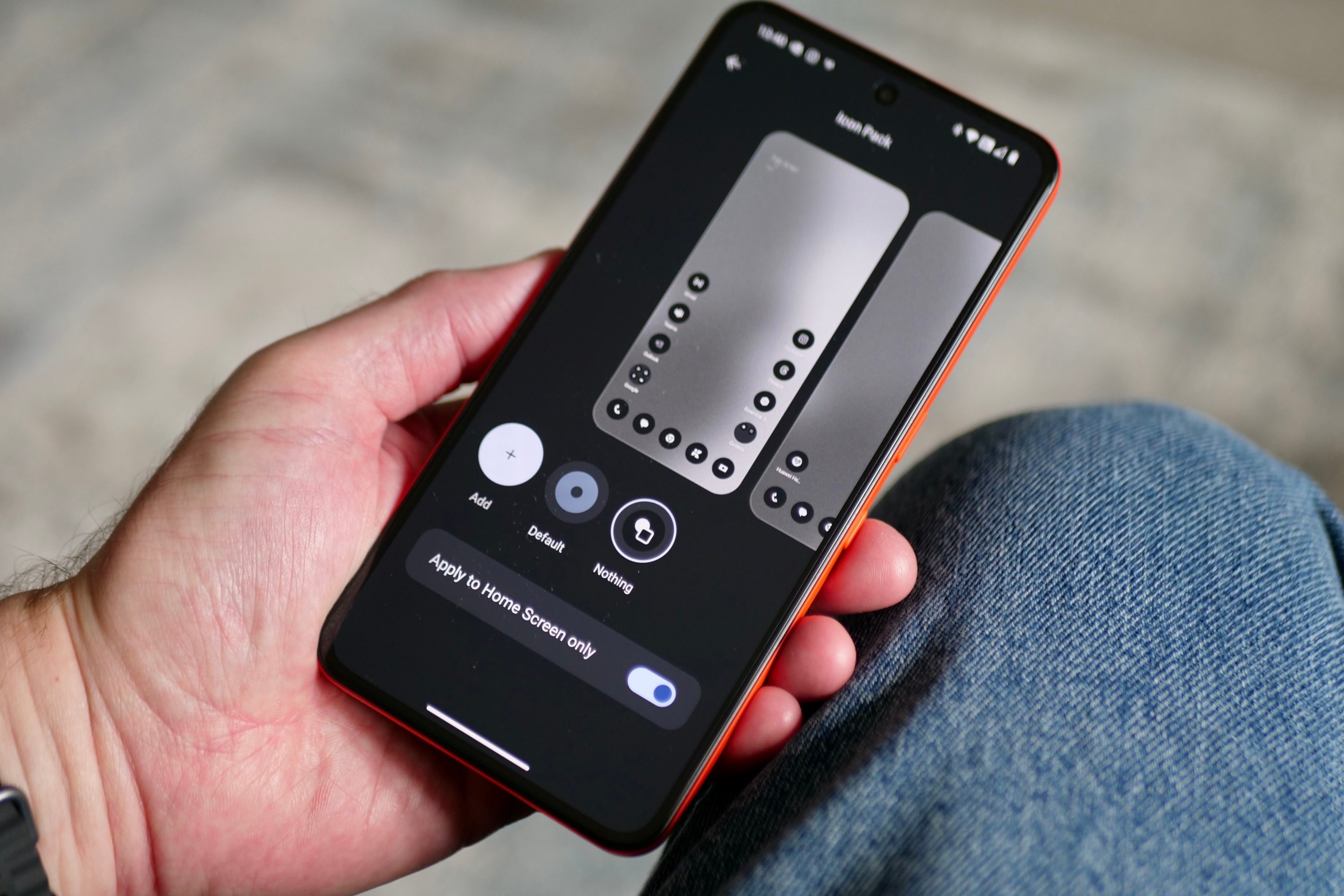 A person holding the CMF Phone 2 Pro.