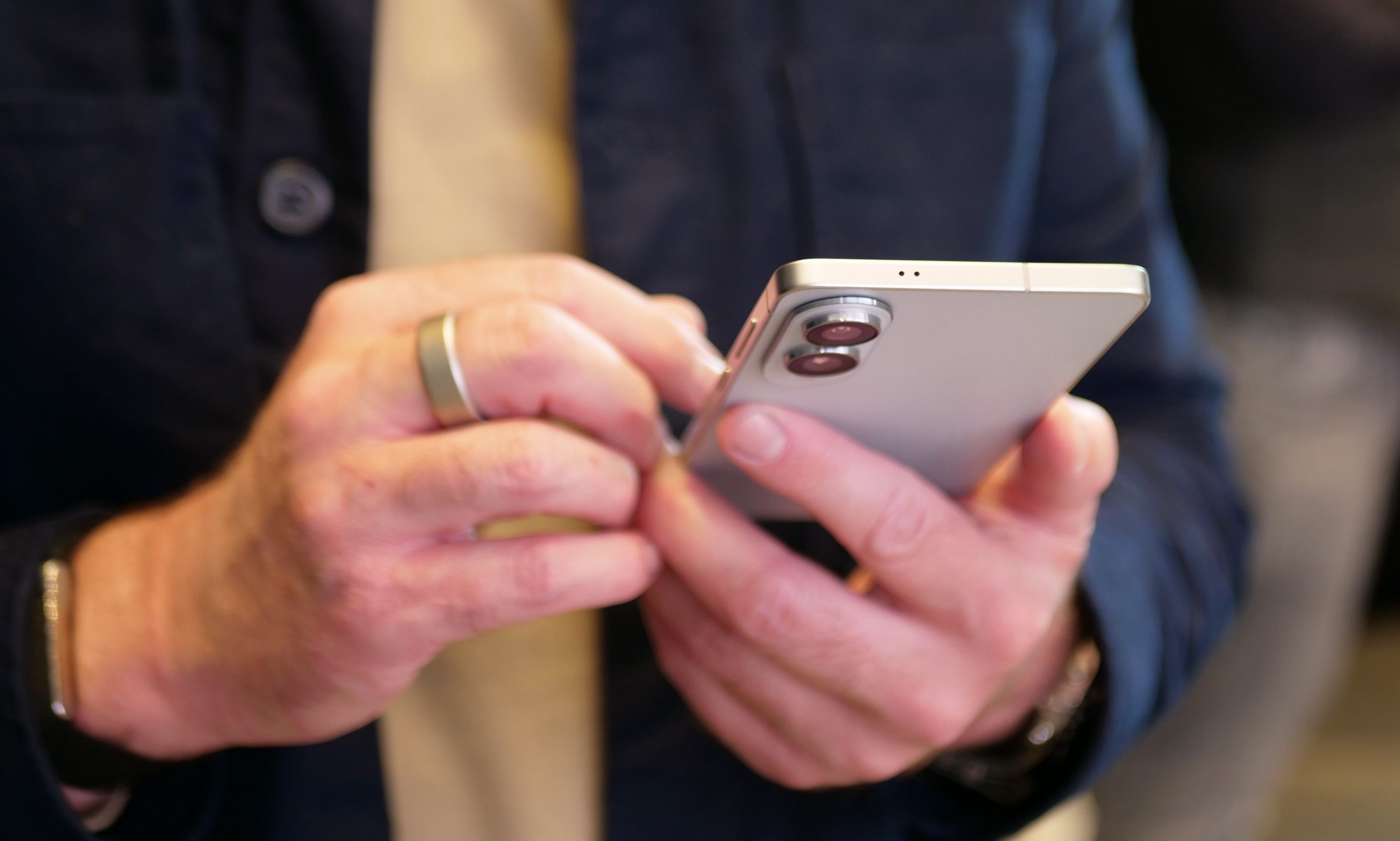 A person holding the Samsung Galaxy S25 Edge.