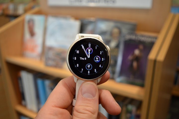 The Garmin Vivoactive 6's display, scratches visible.