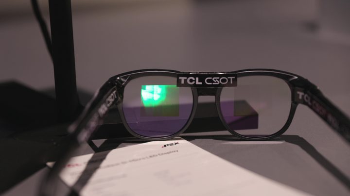A small MLED display in a pair of smart glasses.
