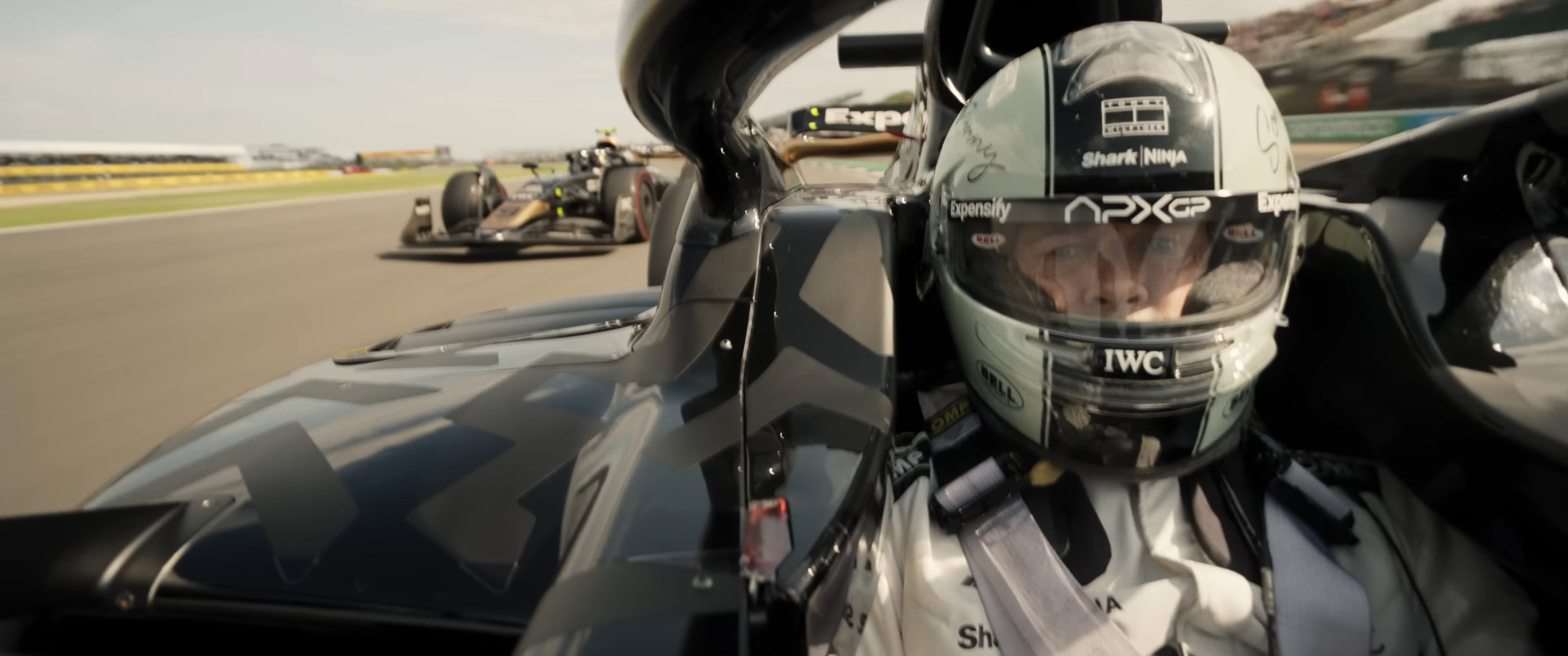 Brad Pitt driving a racecar in "F1."