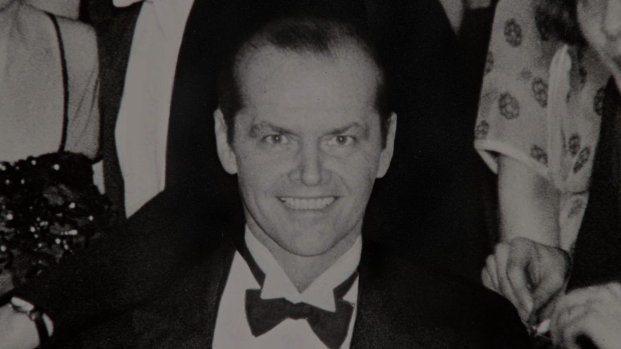 Jack smiling in a black-and-white photograph in "The Shining."