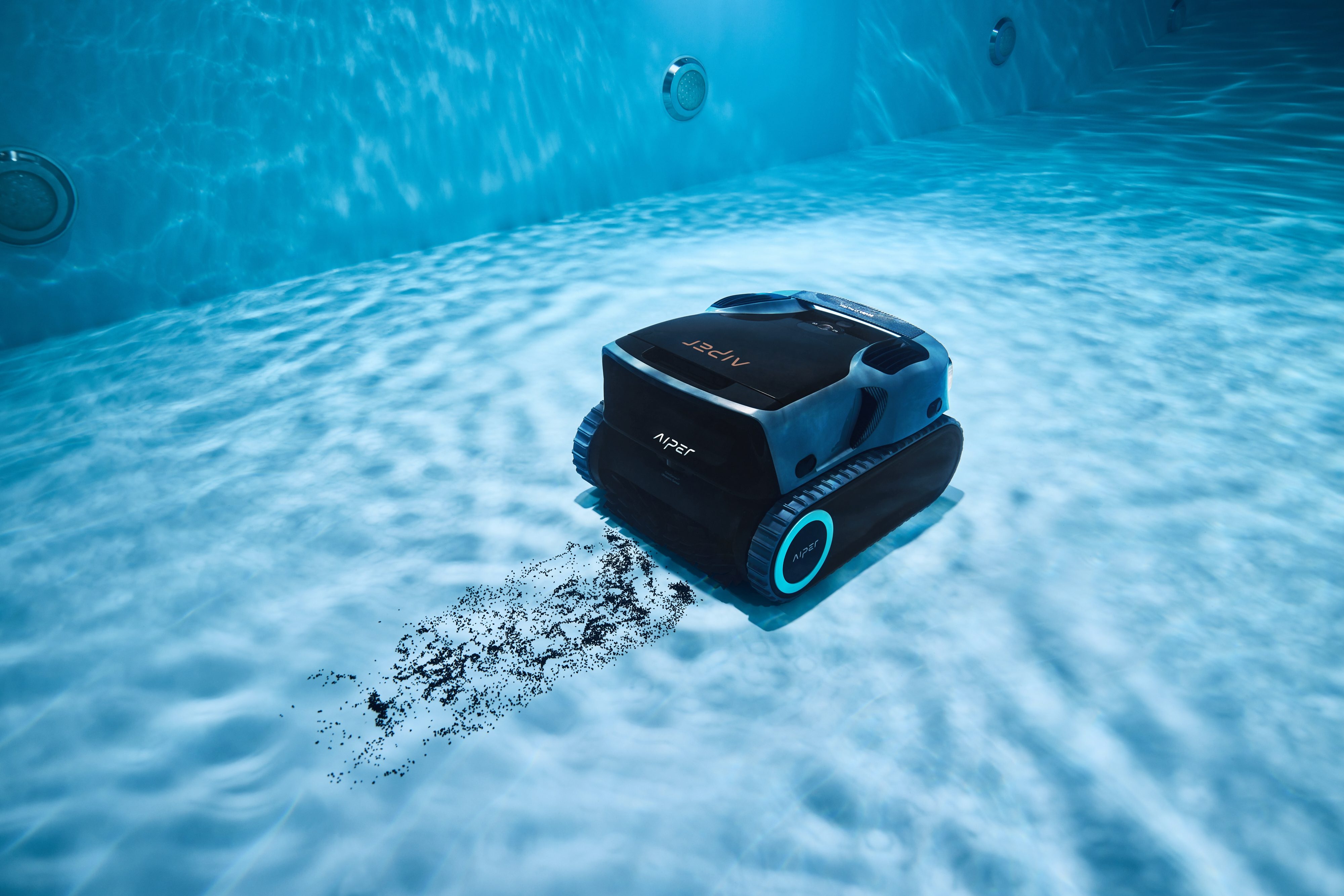 An Aiper Scuba X1 Pro Max cleaning the bottom of a pool.