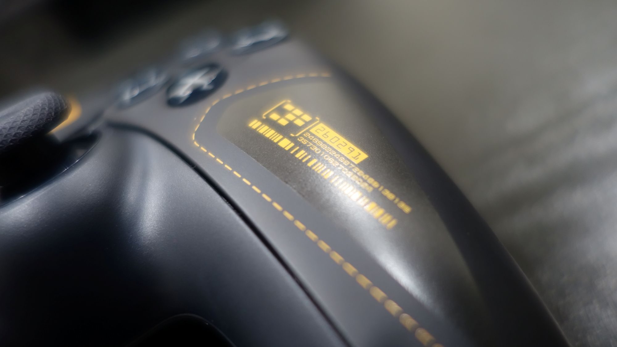 The right grip of a Death Stranding 2 DualSense is shown.
