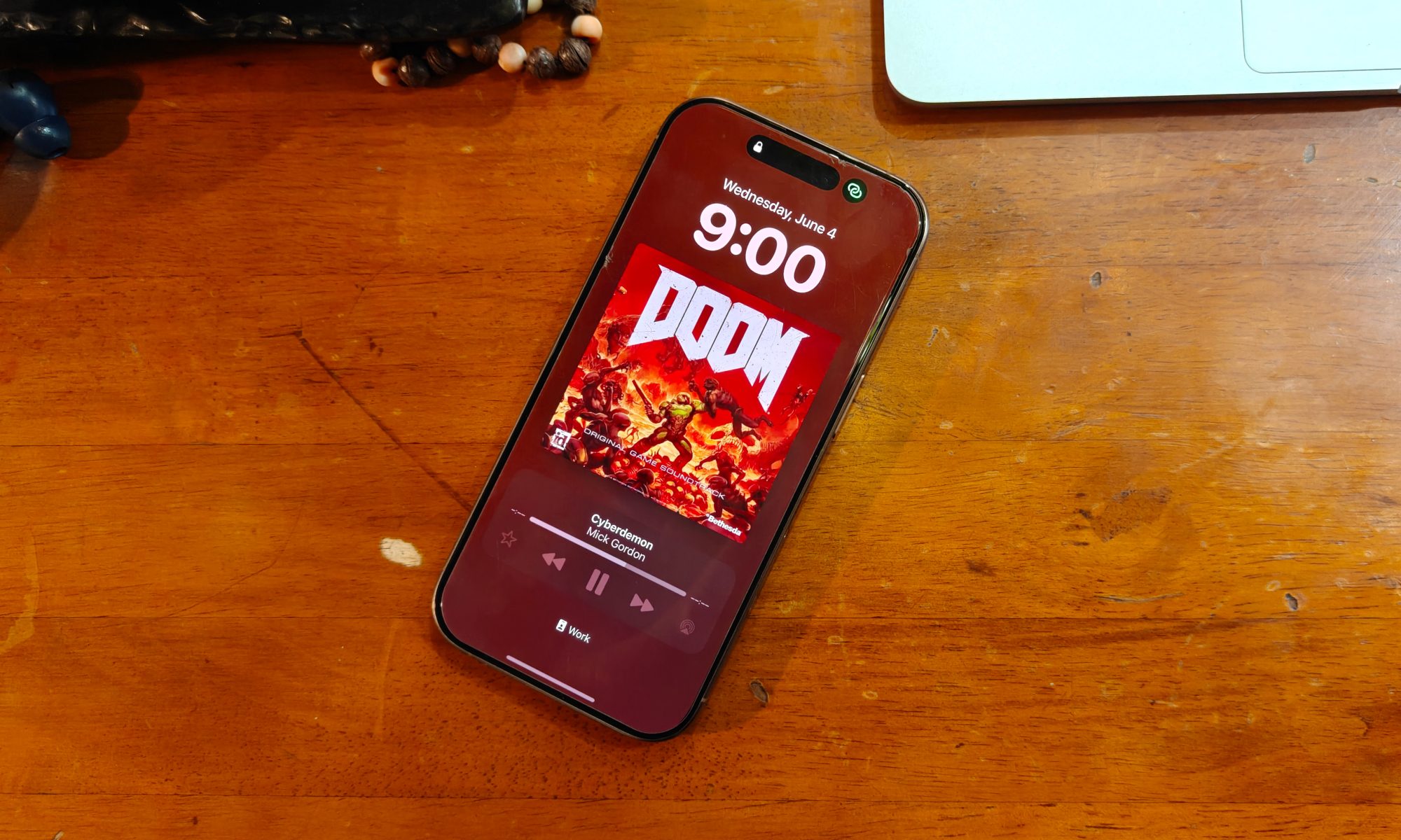 Album cover art on an iPhone's lock screen.