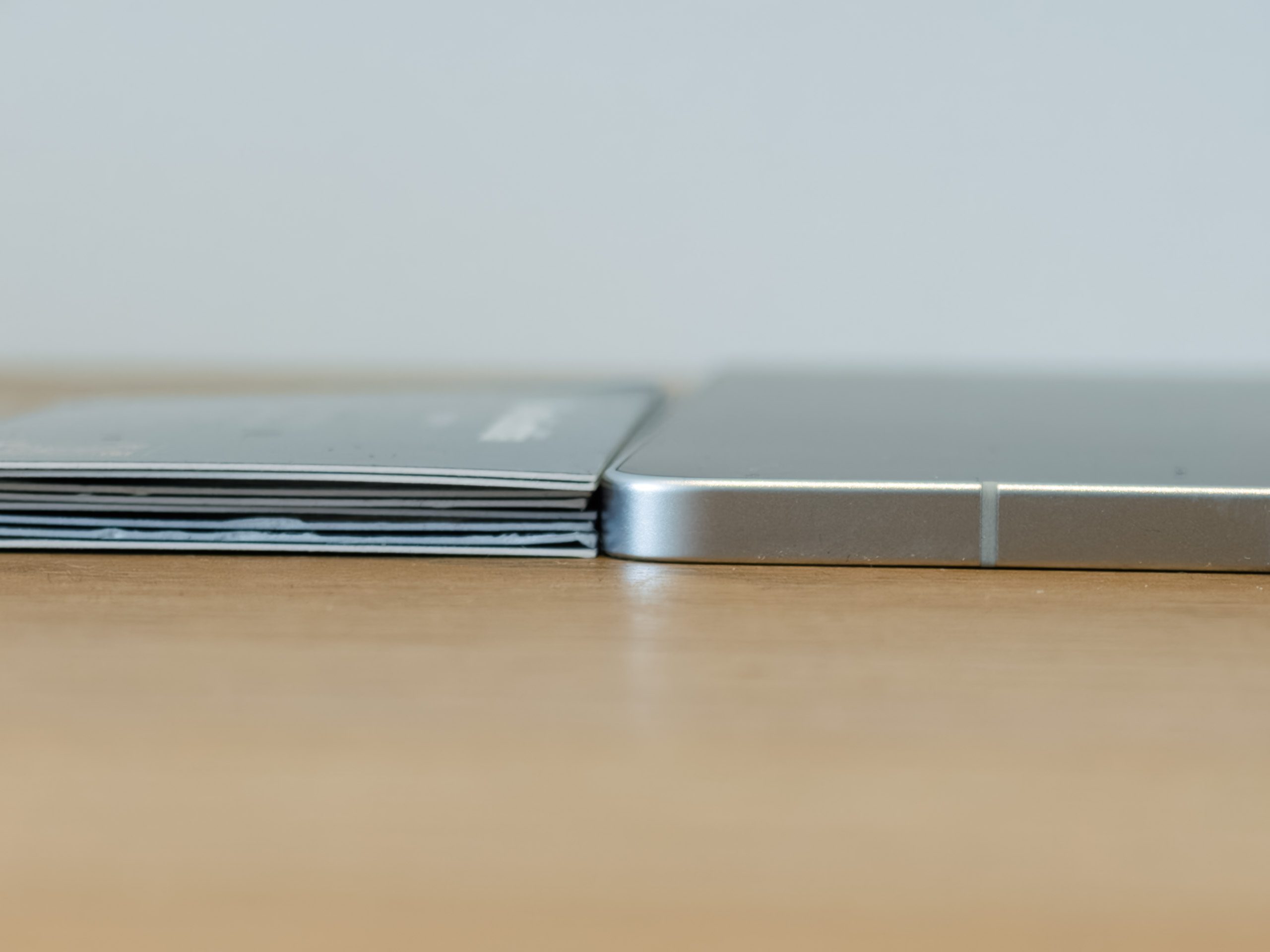 Galaxy S25 Edge next to several business cards stacked