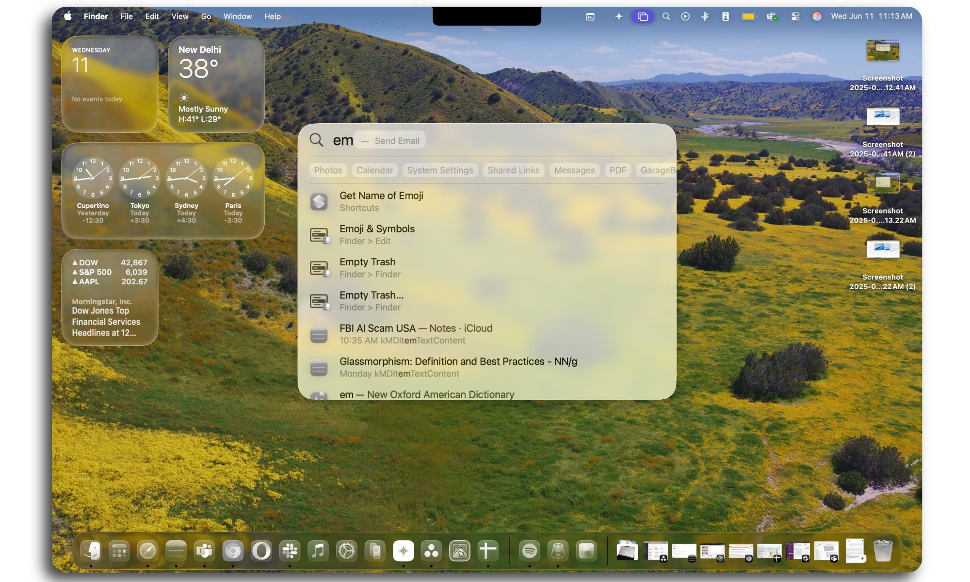 Navigating with Spotlight on a MacBook Air featuring macOS Tahoe.