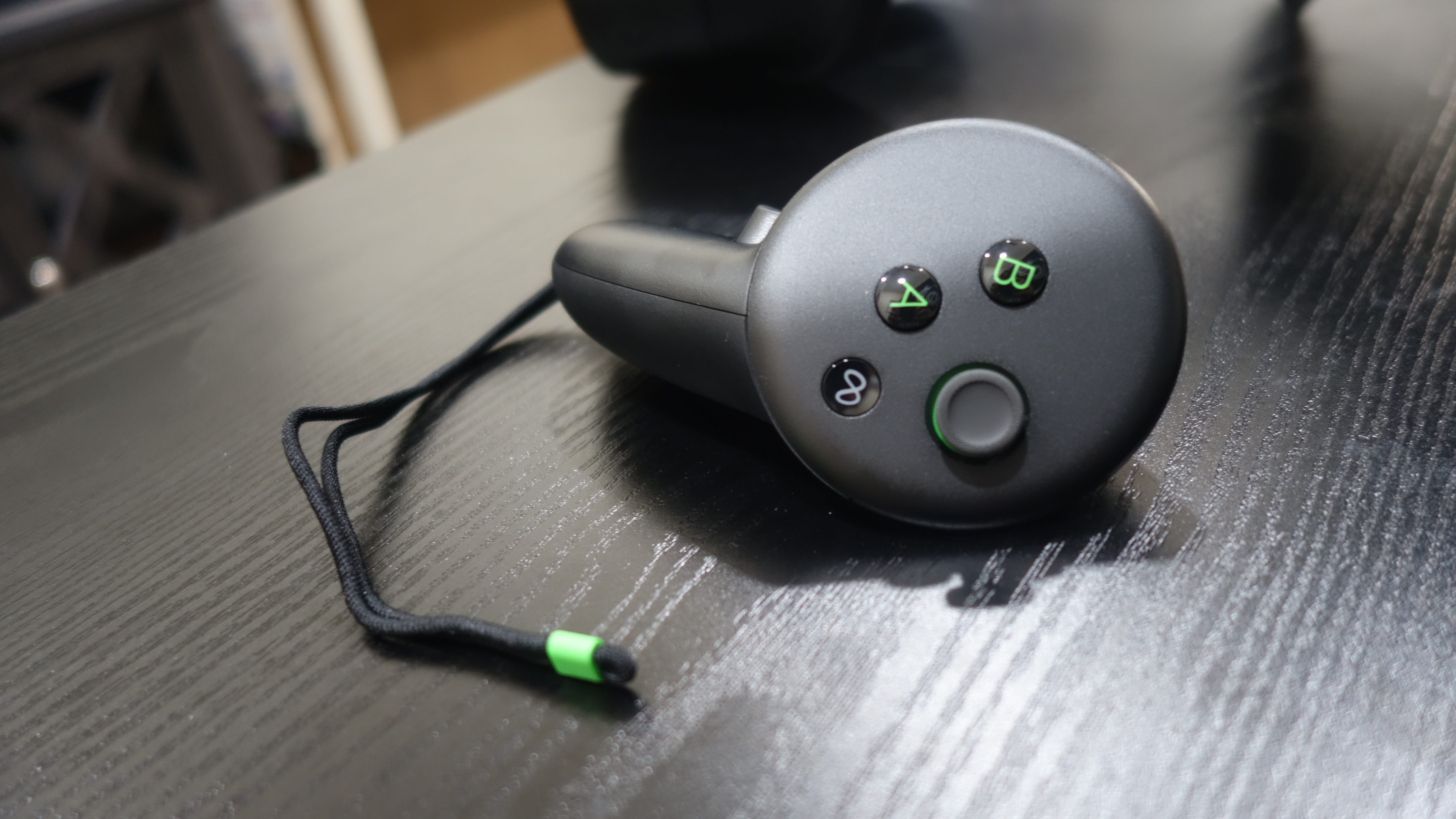 An Xbox branded Meta Quest 3S controller sits on a table.