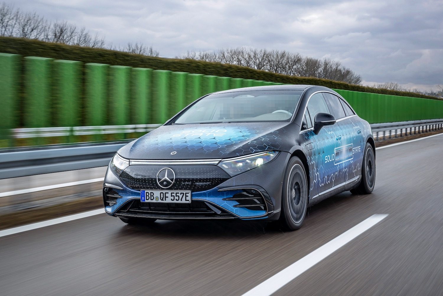 Mercedes-Benz EQS solid-state battery test vehicle on the highway.