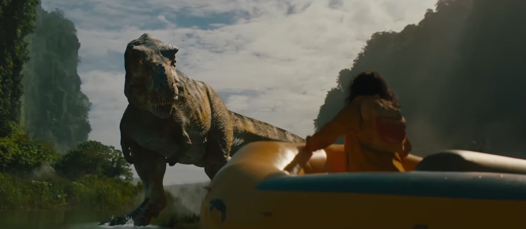 A T-Rex staring at a person on a raft in "Jurassic World Rebirth."