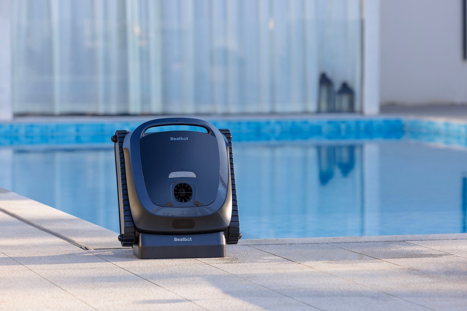 The Beatbot Aquasense 2 beside the swimming pool.