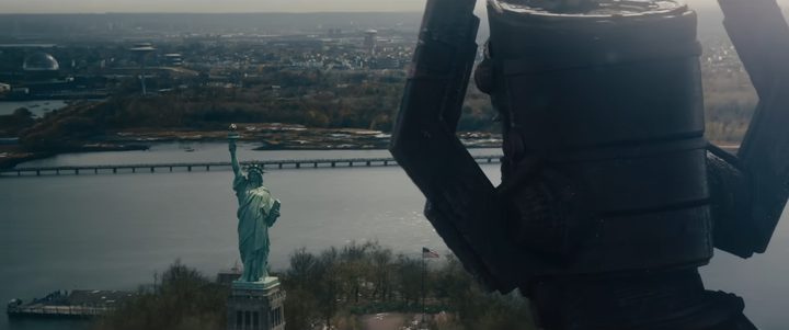 Galactus looking at the Statue of Liberty in The Fantastic Four First Steps.