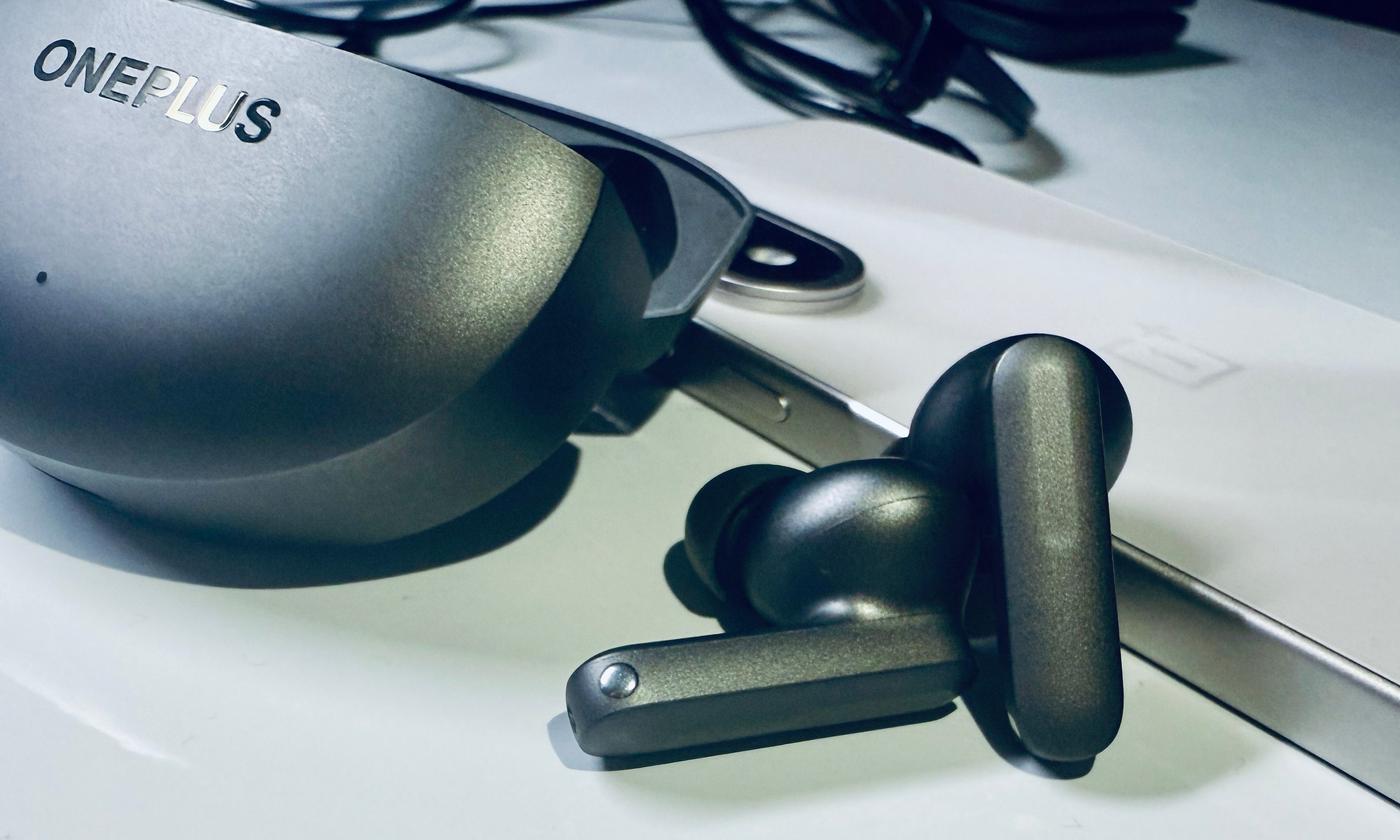 OnePlus Buds 4 earbuds macro view.