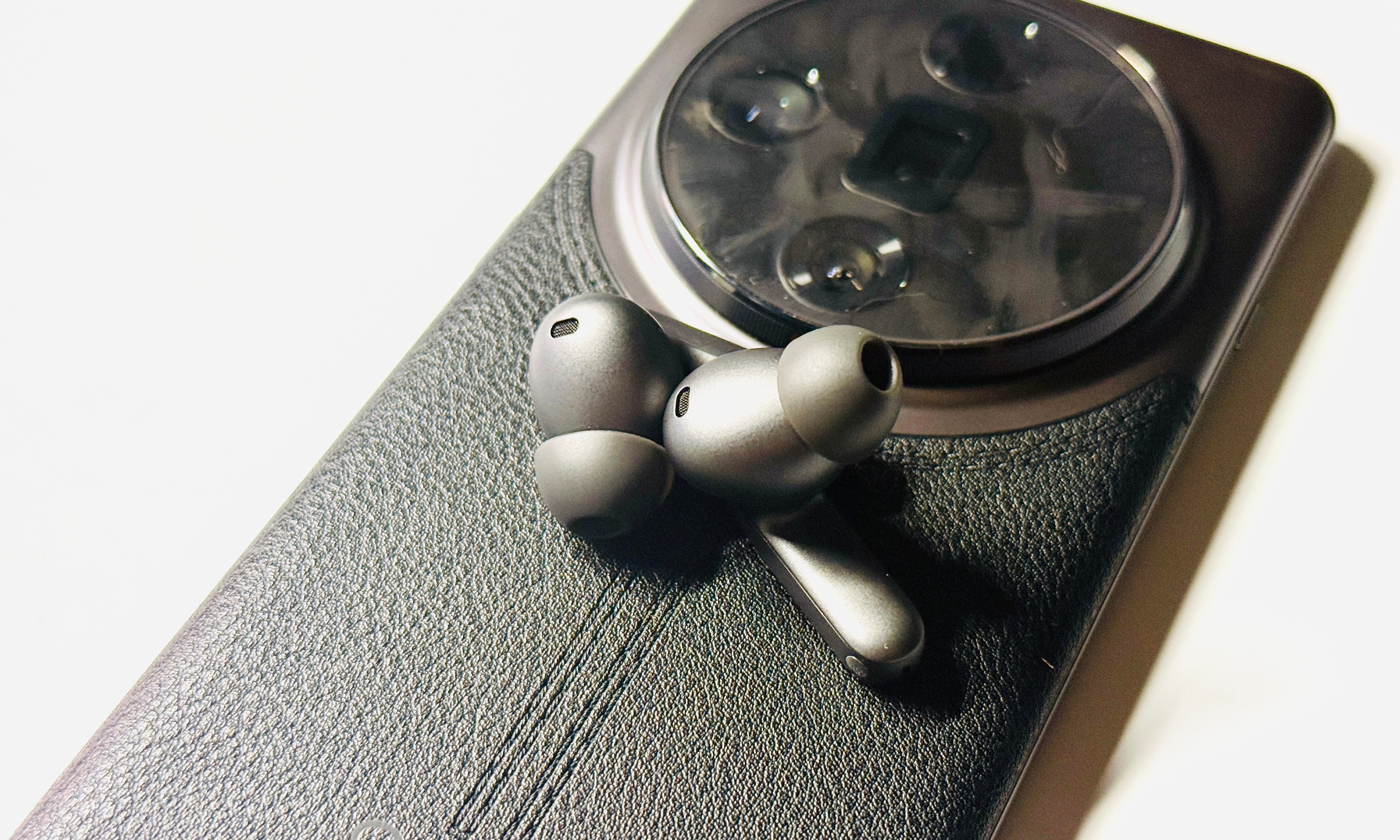 Closeup view of tips on OnePlus Buds 4 earbuds.