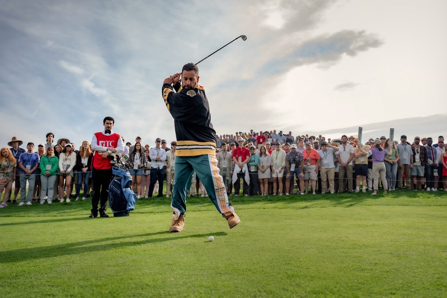 Happy Gilmore swings a club.
