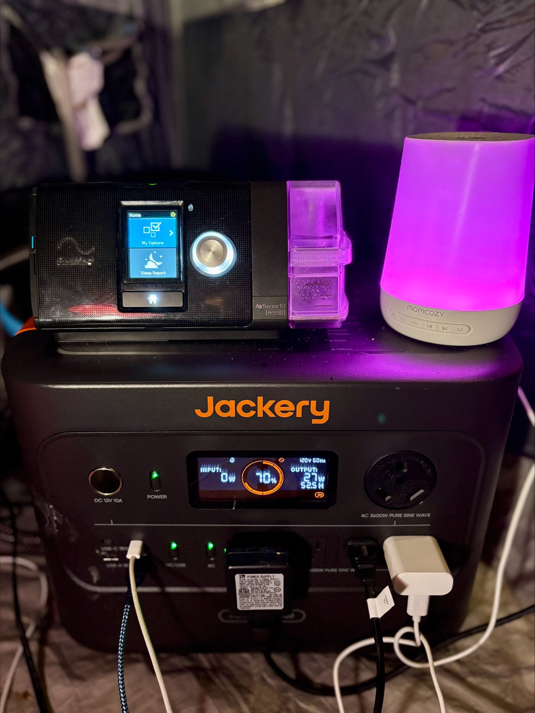 Multiple devices plugged into the Jackery HomePower 3000