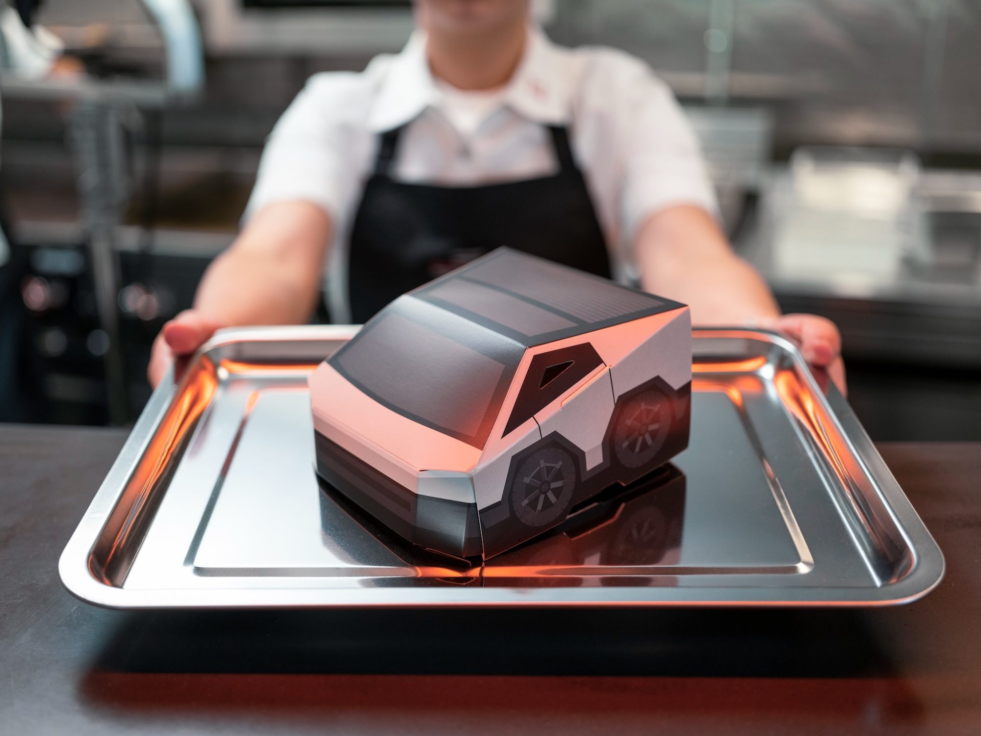 A Cybertruck-inspired food container at the Tesla Diner.