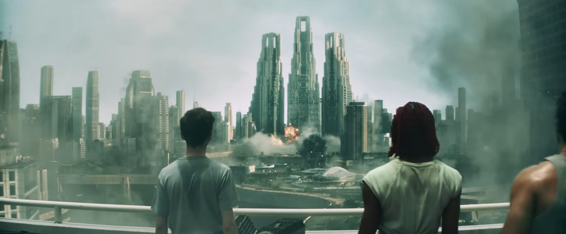 A group of people looking at a spaceship crashing into a futuristic city in Alien: Earth.