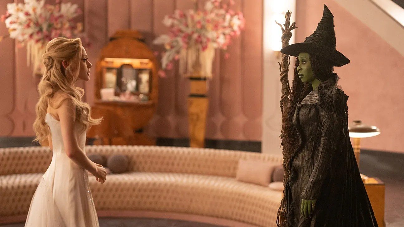 Two witches look at each other.