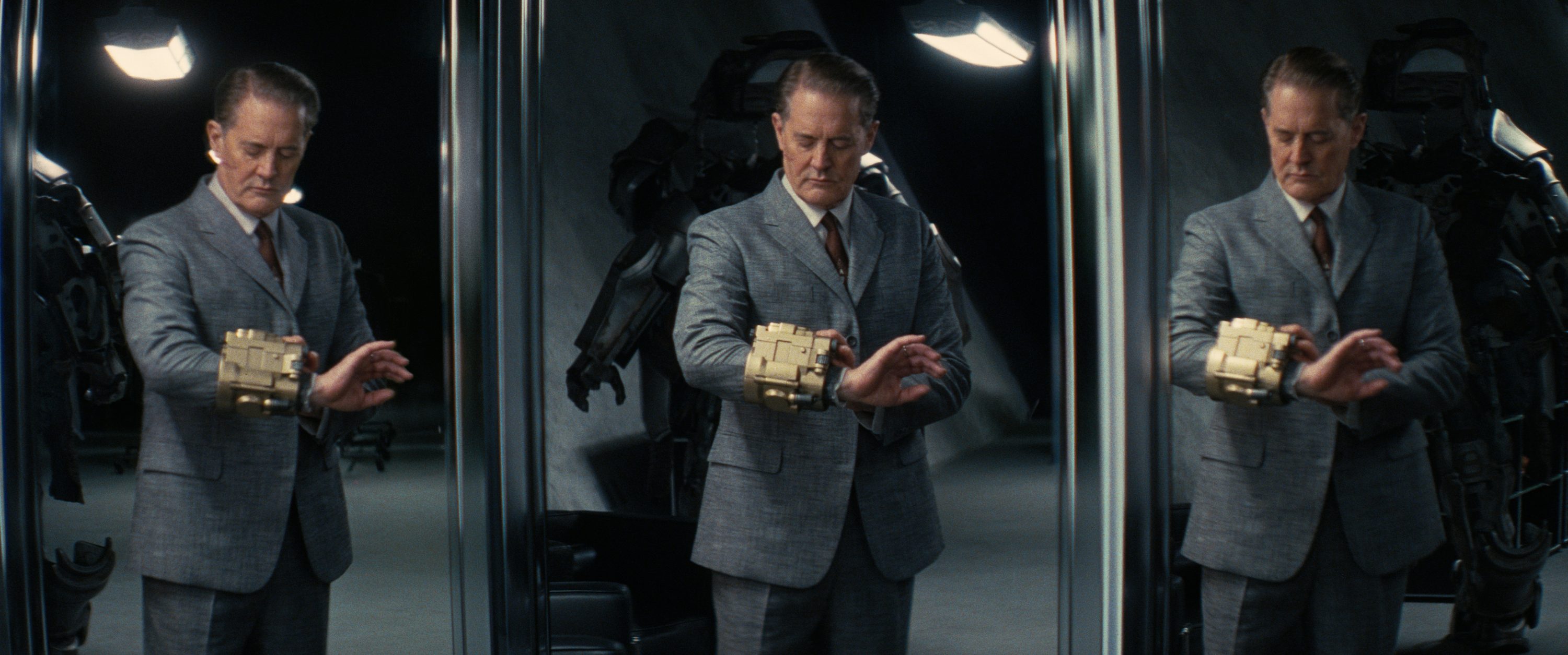 A man looks at his watch.