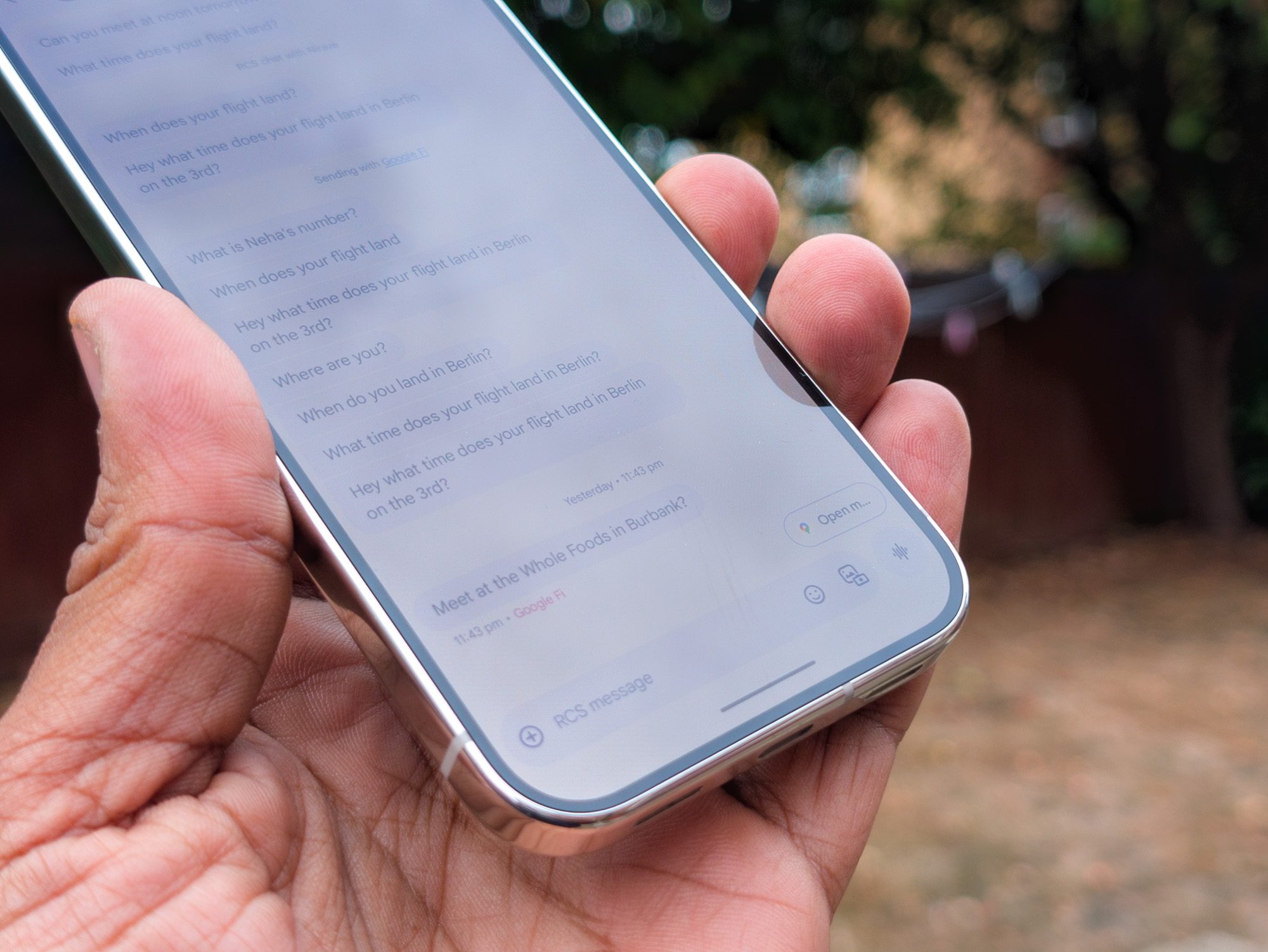 Maps suggested reply in Magic Cue on the Google Pixel 10 Pro in Porcelain in the hand