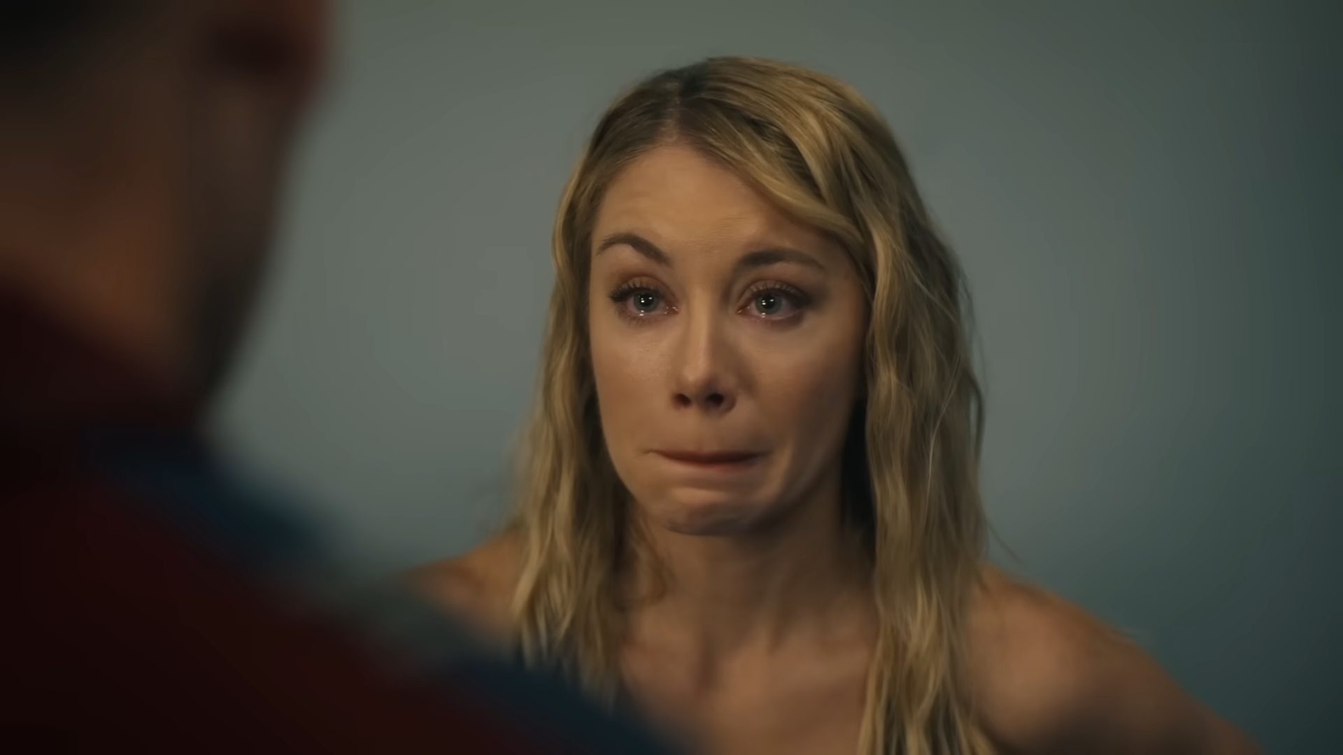 Jennifer Holland as Emilia Harcourt crying in Peacemaker.