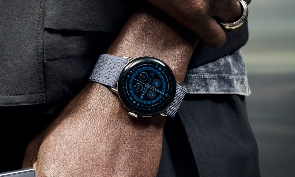 The Google Pixel Watch 4 on the wrist of an arm at the side of the body
