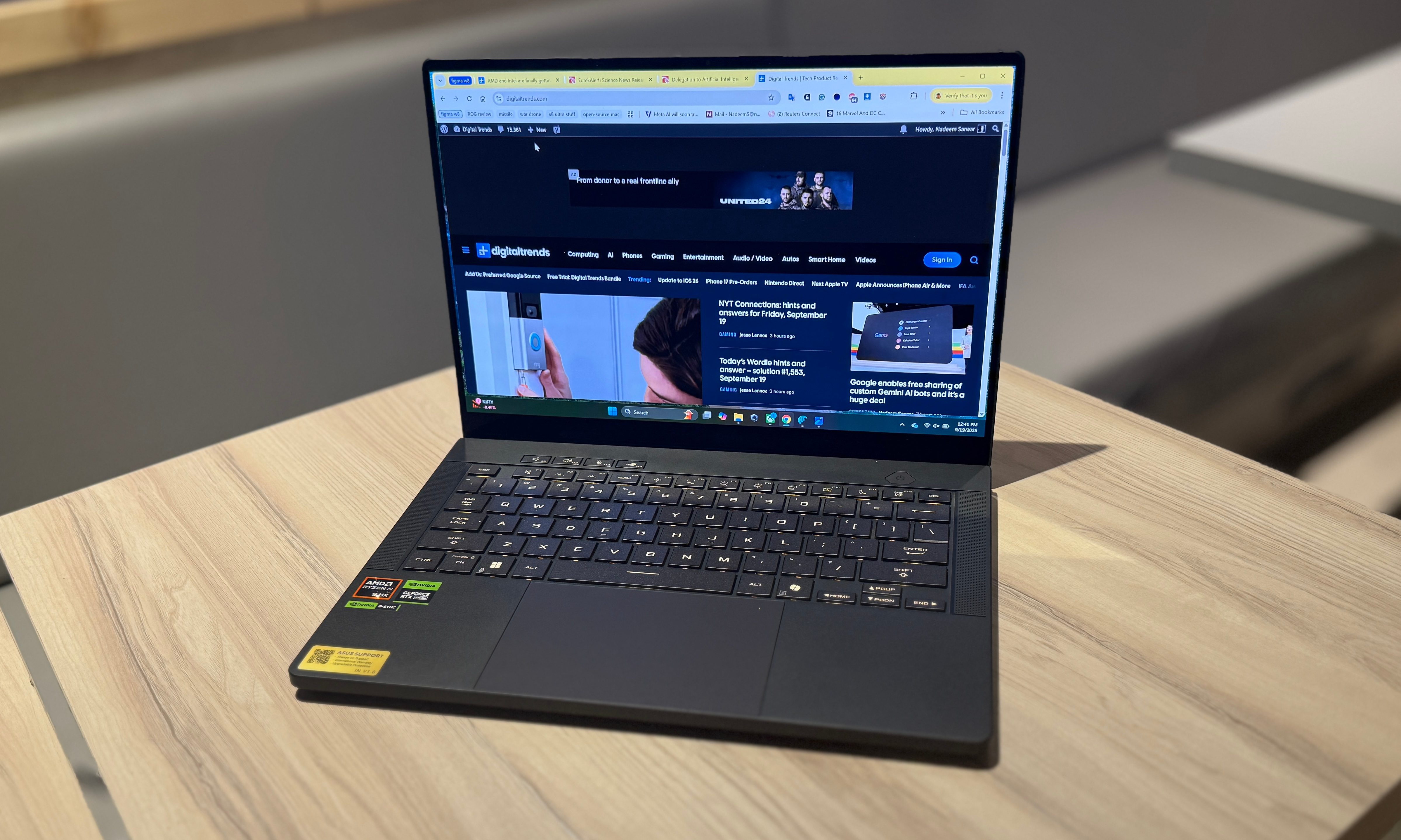 Asus ROG Zephyrus G14 laptop featured atop a table.