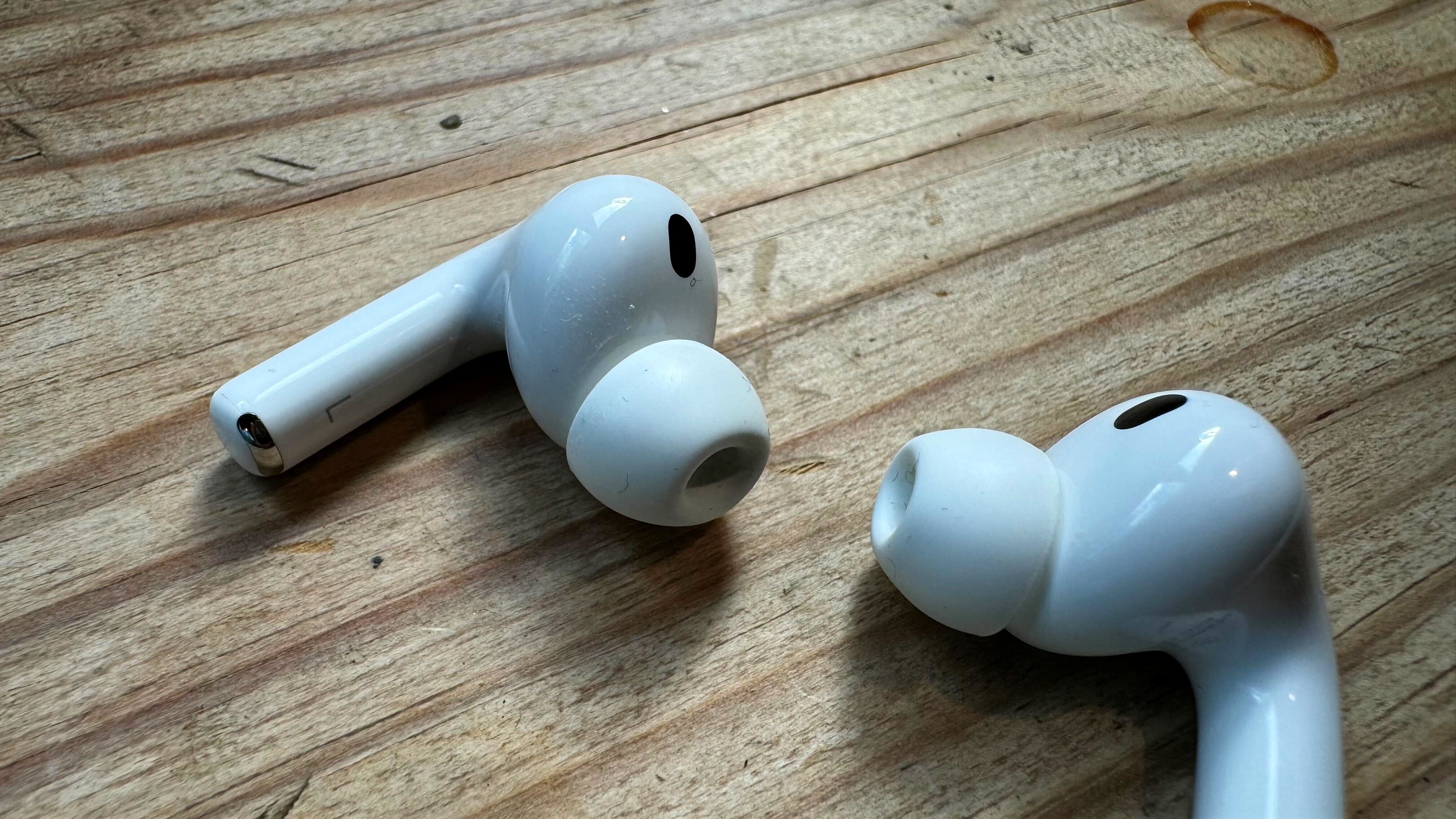 The AirPods Pro 3 buds out of the case