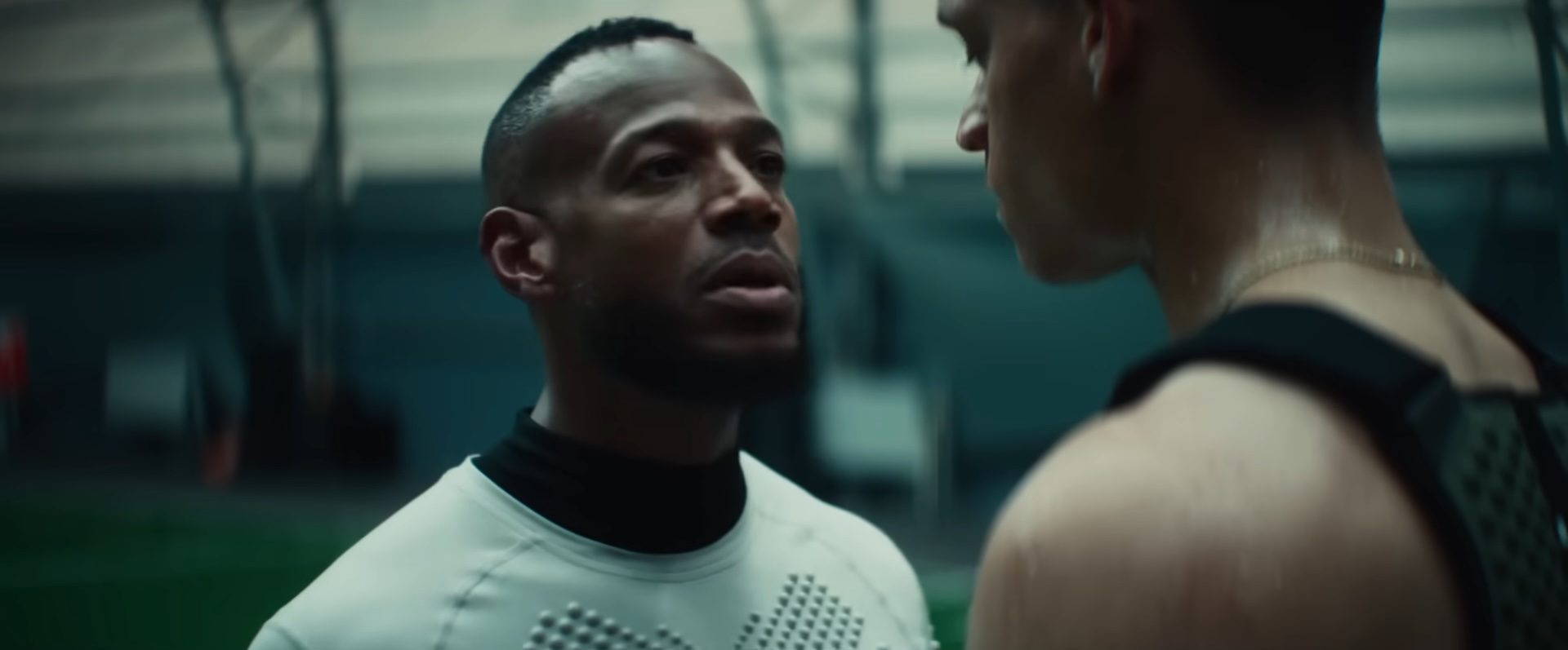 Marlon Wayans looking at Tyriq Withers in Him.