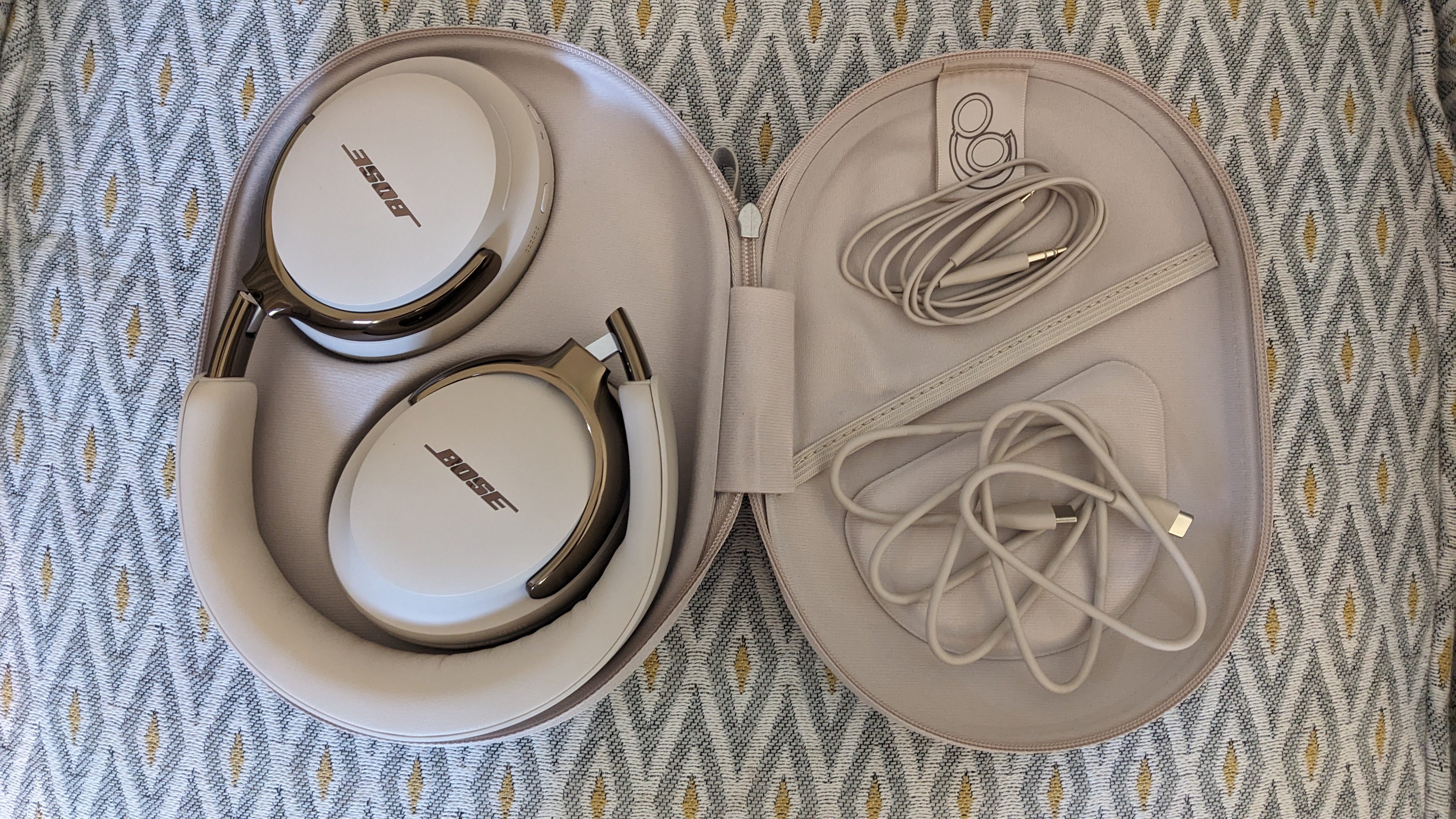 Bose QuietComfort Ultra Headphones (2nd Gen) in their case with cable accessories