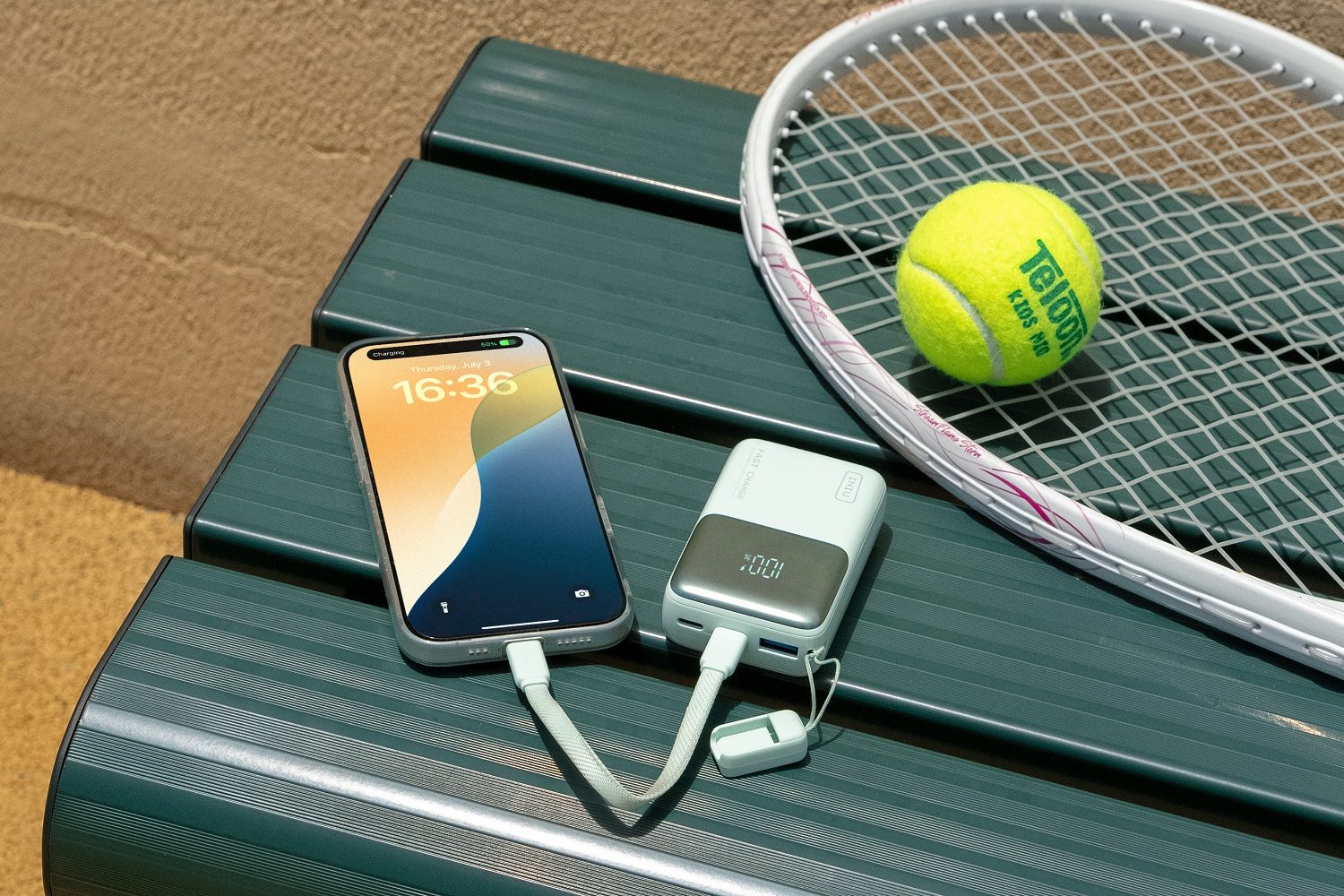 The INIU Pocket Rocket P50 10000mAh Power Bank charging a smartphone.