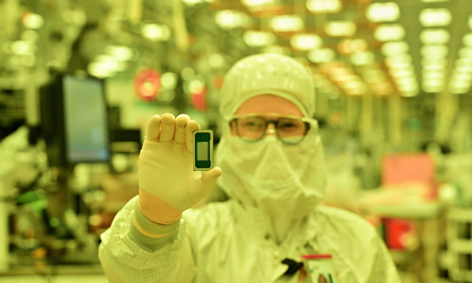 Person holding a Panther Lake chip.
