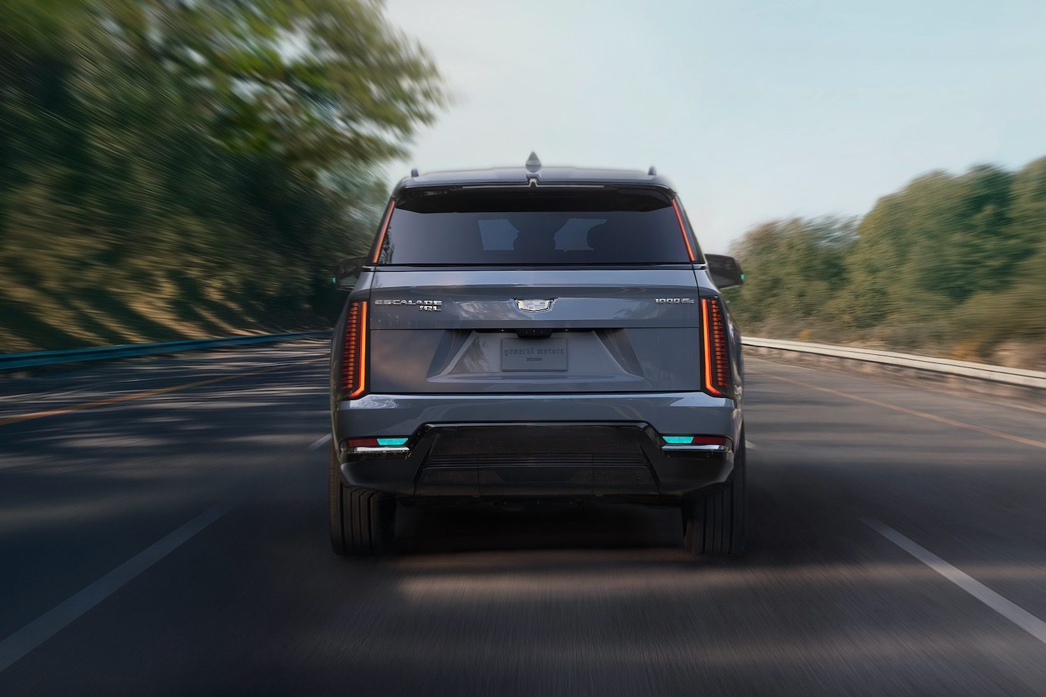 Rear view of a Cadillac Escalade IQ with turquoise marker lights.