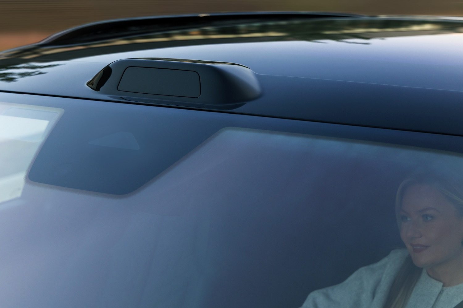 Rendering of a lidar sensor mounted above the windshield on a Cadillac Escalade IQ.